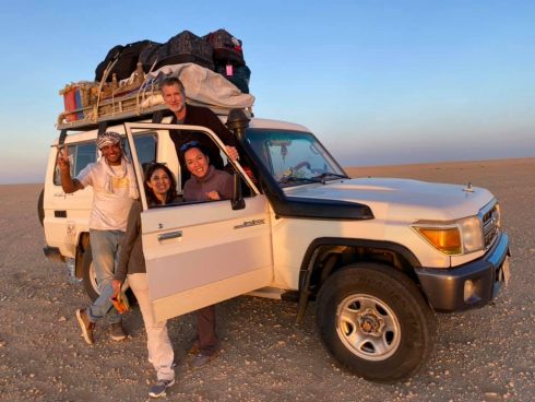 A group of 4 people posing for a photo | Travel Egypt Now