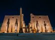 The Temple of Karnak and its obelisk illuminated at night, showcasing Egypt's rich history and beauty.